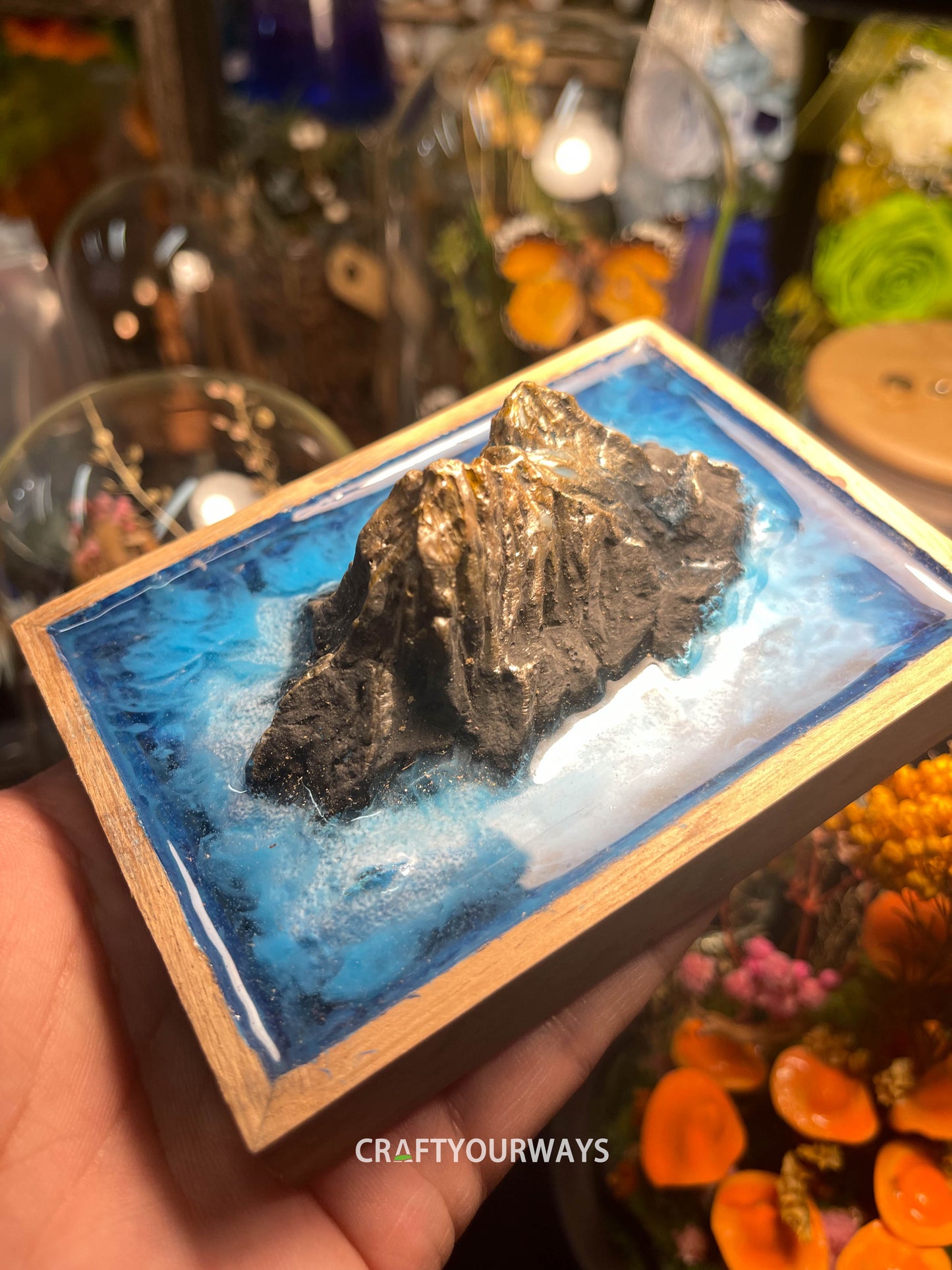 Miniature Mountain Island Scene with Snow-Capped Peak
