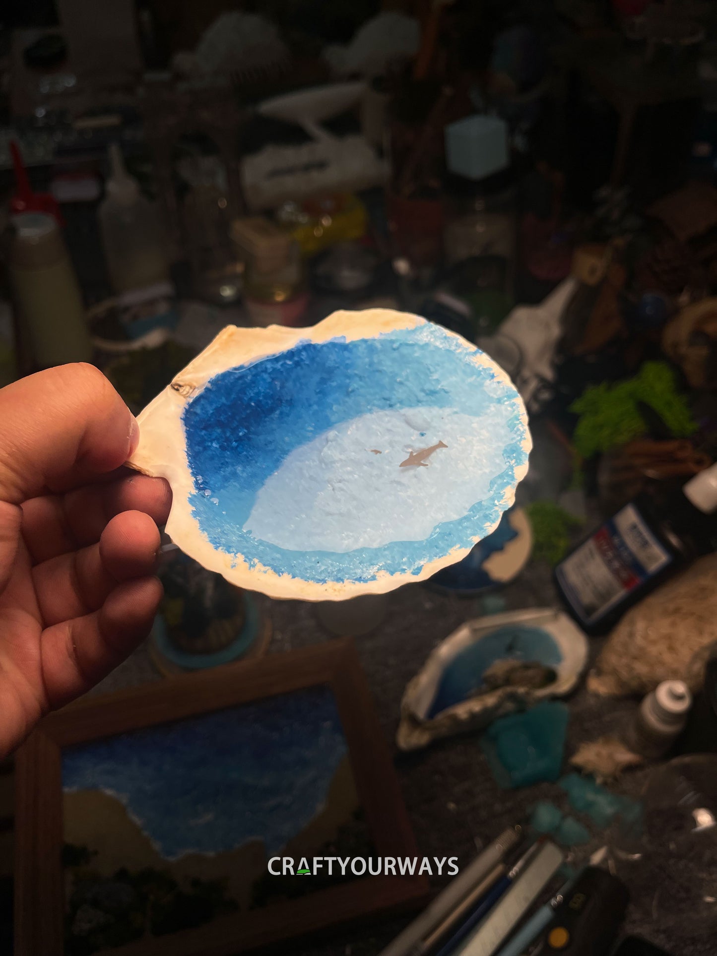 Miniature Whale Swimming in Ocean Inside Scallop Shell