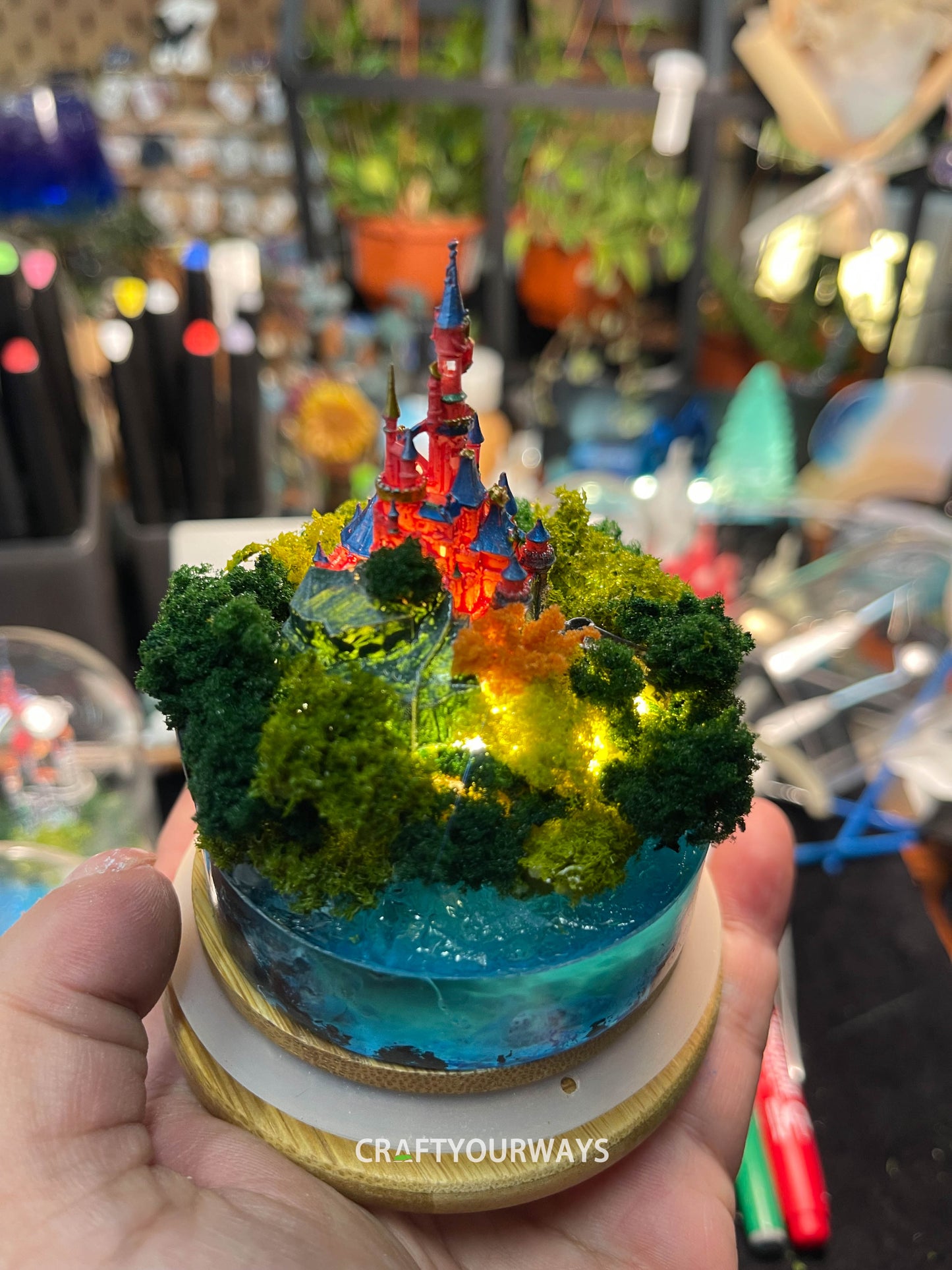 Miniature Fairytale Red Castle with Illuminated Resin Ocean and Island Plants