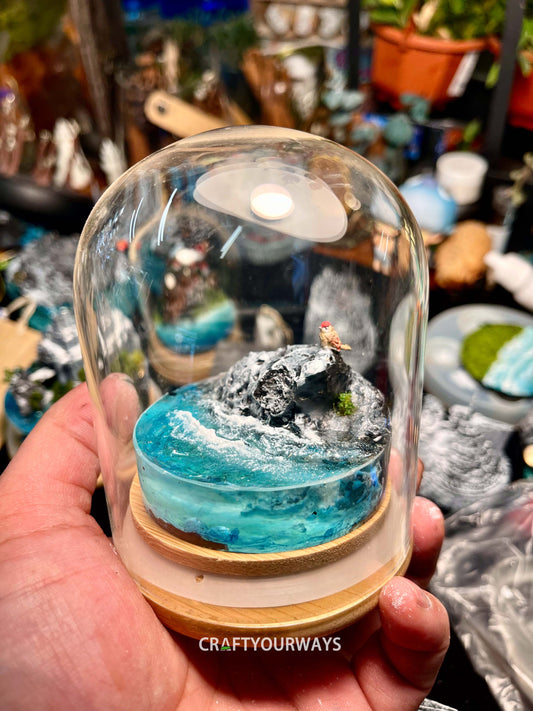 Miniature Ocean Scene with Illuminated Boulder and Underwater Lights