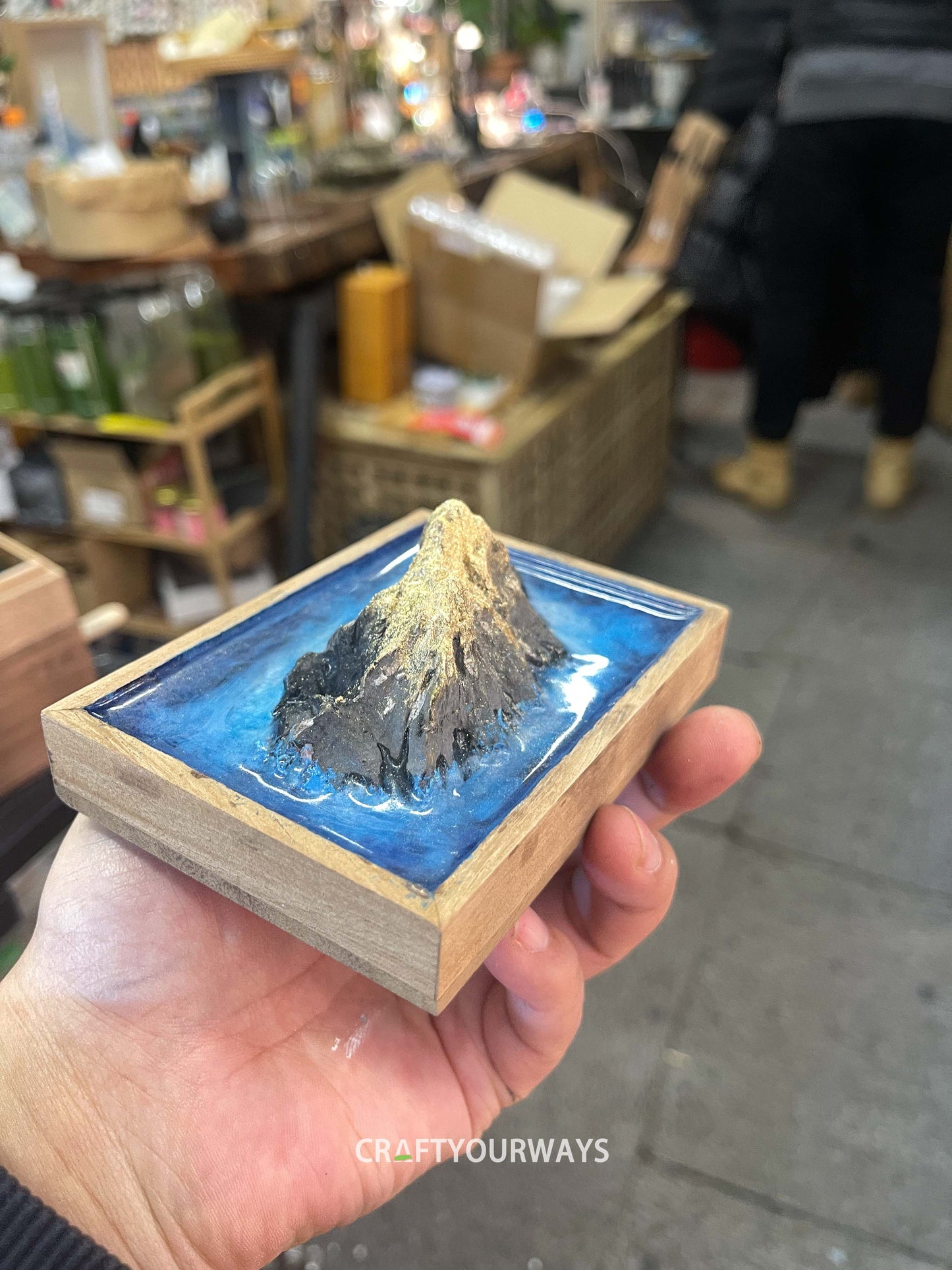 Miniature Mountain Island Scene with Snow-Capped Peak