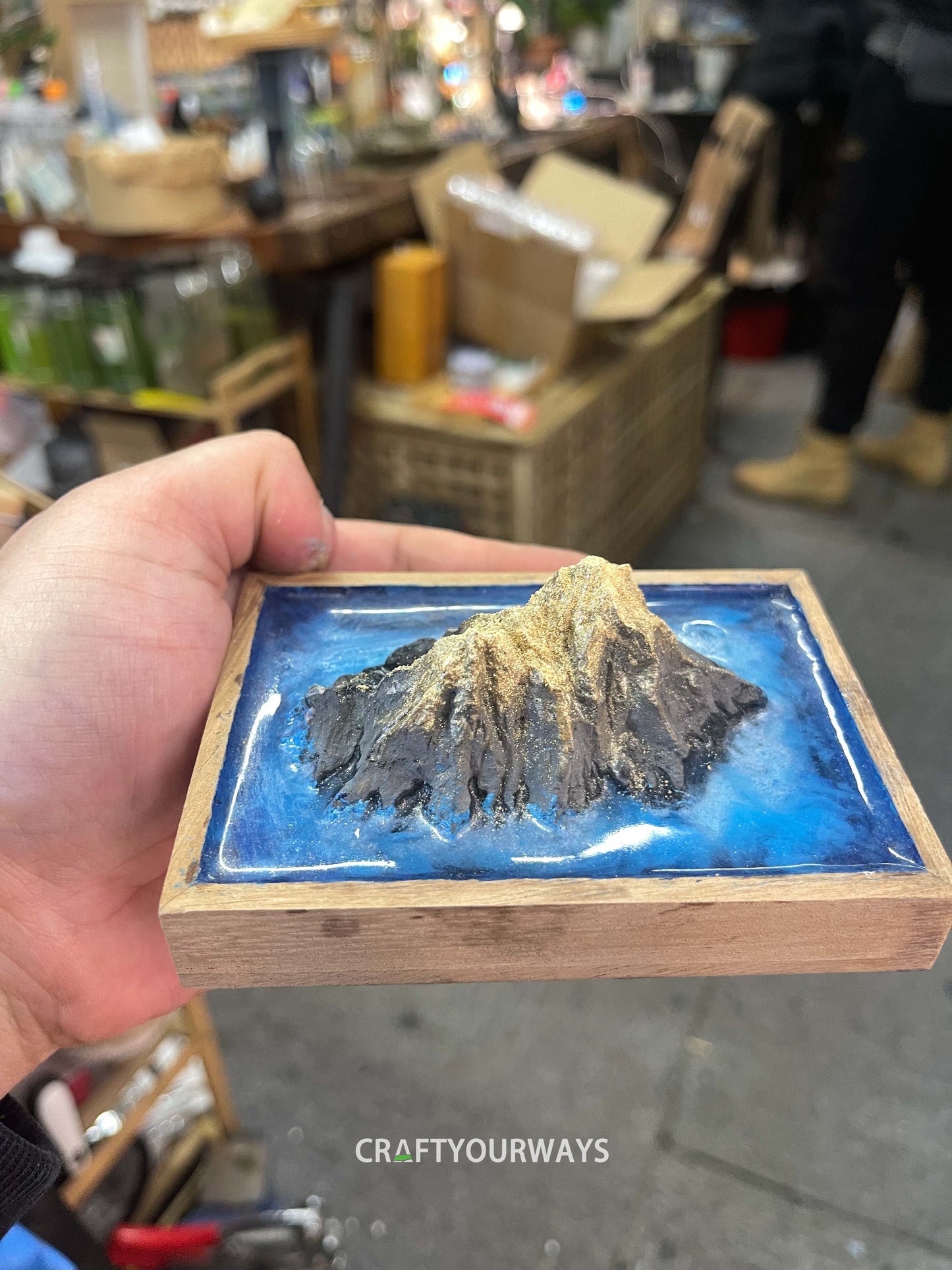 Miniature Mountain Island Scene with Snow-Capped Peak