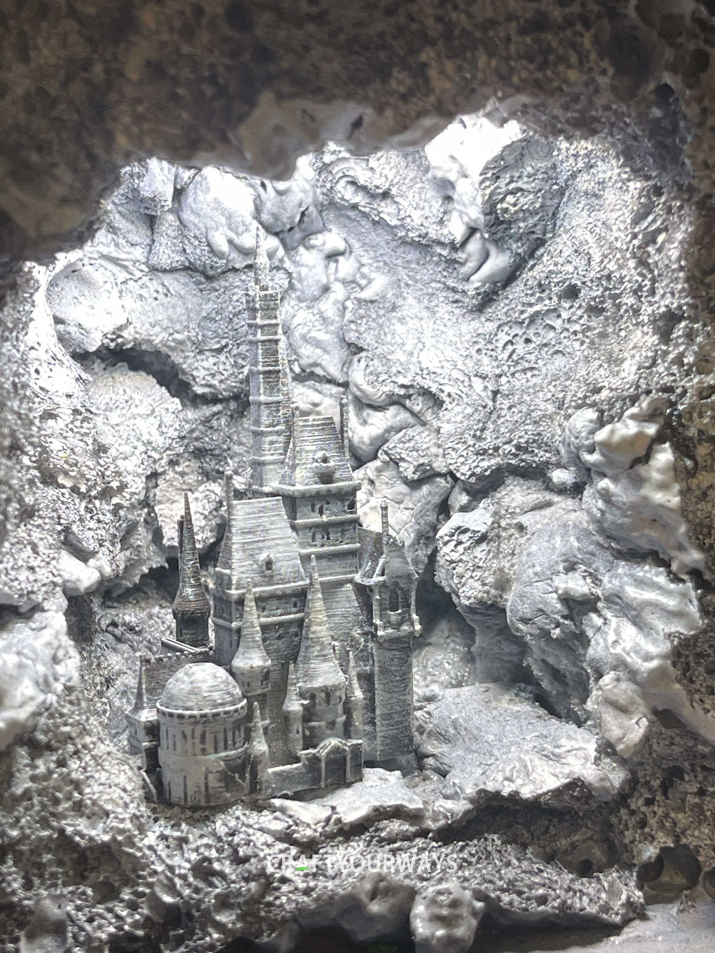 Miniature Castle in Snowy Cave with Illuminated Interior